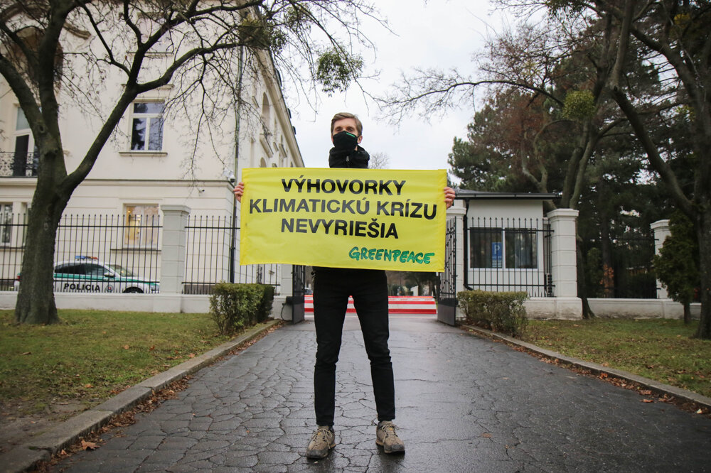 Campaign coordinator Pavol Fábry protests in front of the Government's Office.