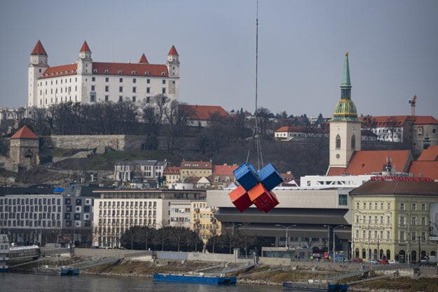 A helicopter carries and moves the KUVYT installation from Ľudovít Štúr Square to Tyrš Waterfront in Bratislava on March 4, 2021.