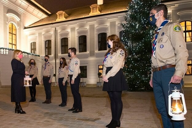 The President of the Slovak Republic, Zuzana Čaputová, received the Peace Light from Bethlehem from the scouts in the courtyard of the Presidential Palace in Bratislava on December 15, 2020.