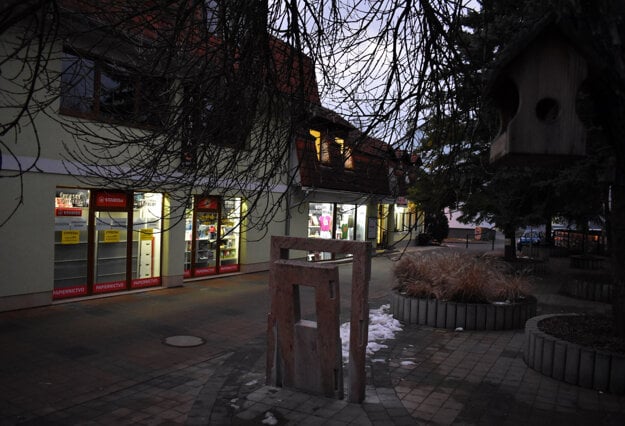 Park of Forgotten Neighbours and the Klemo building on Tehelná Street in Zvolen.